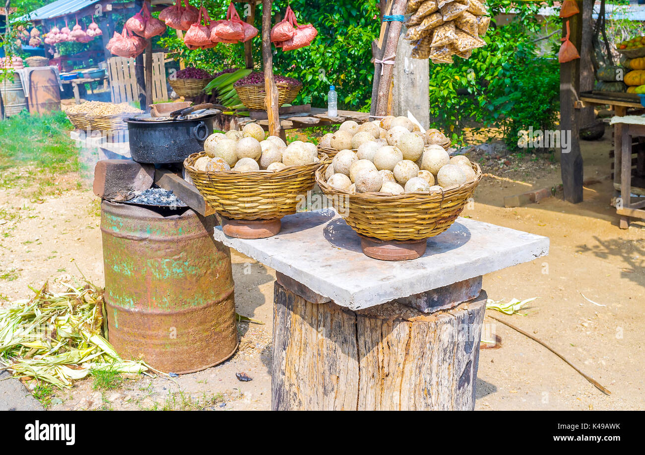 Numerous roadside stalls in Sri Lanka offer wide range of exotic fruits, vegetables and prepared street food Stock Photo