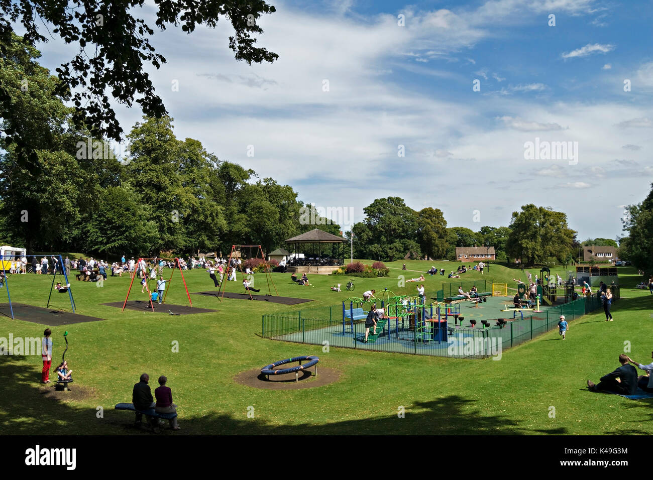 People enjoying a sunny Summer day in Cutts Close Town Park, Oakham, Rutland, England, UK Stock Photo