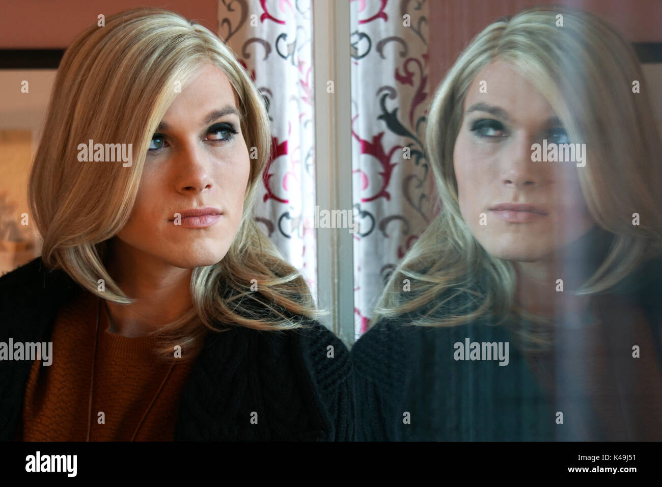Transgender On The Window Stock Photo