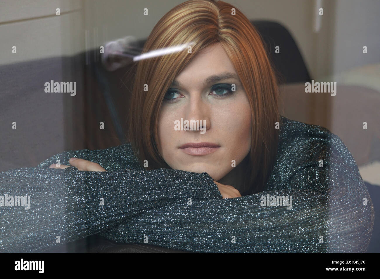 Young Woman Man Gender On The Window Stock Photo