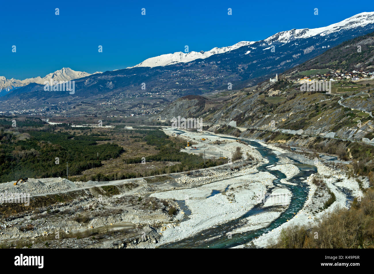 Parched Valley Of The Rhone River Near Leuk Before The Thawing Period In The Alps, Valais, Switzerland Stock Photo