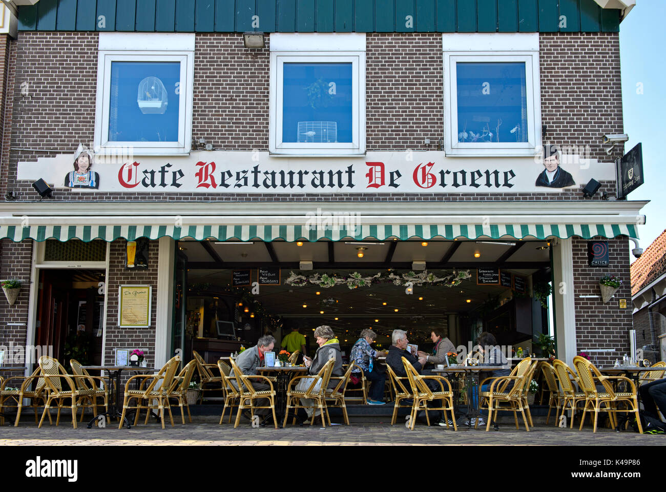 Restauran De Groene At The Harbor Promendade, Volendamm, North Holland, Netherlands Stock Photo