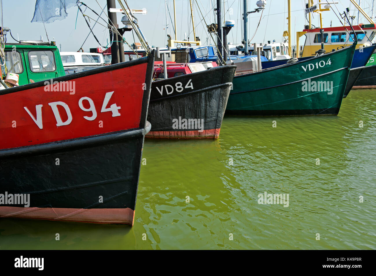 Bows Of Fishing Vessels In The Harbor, Volendamm, North Holland, Netherlands Stock Photo