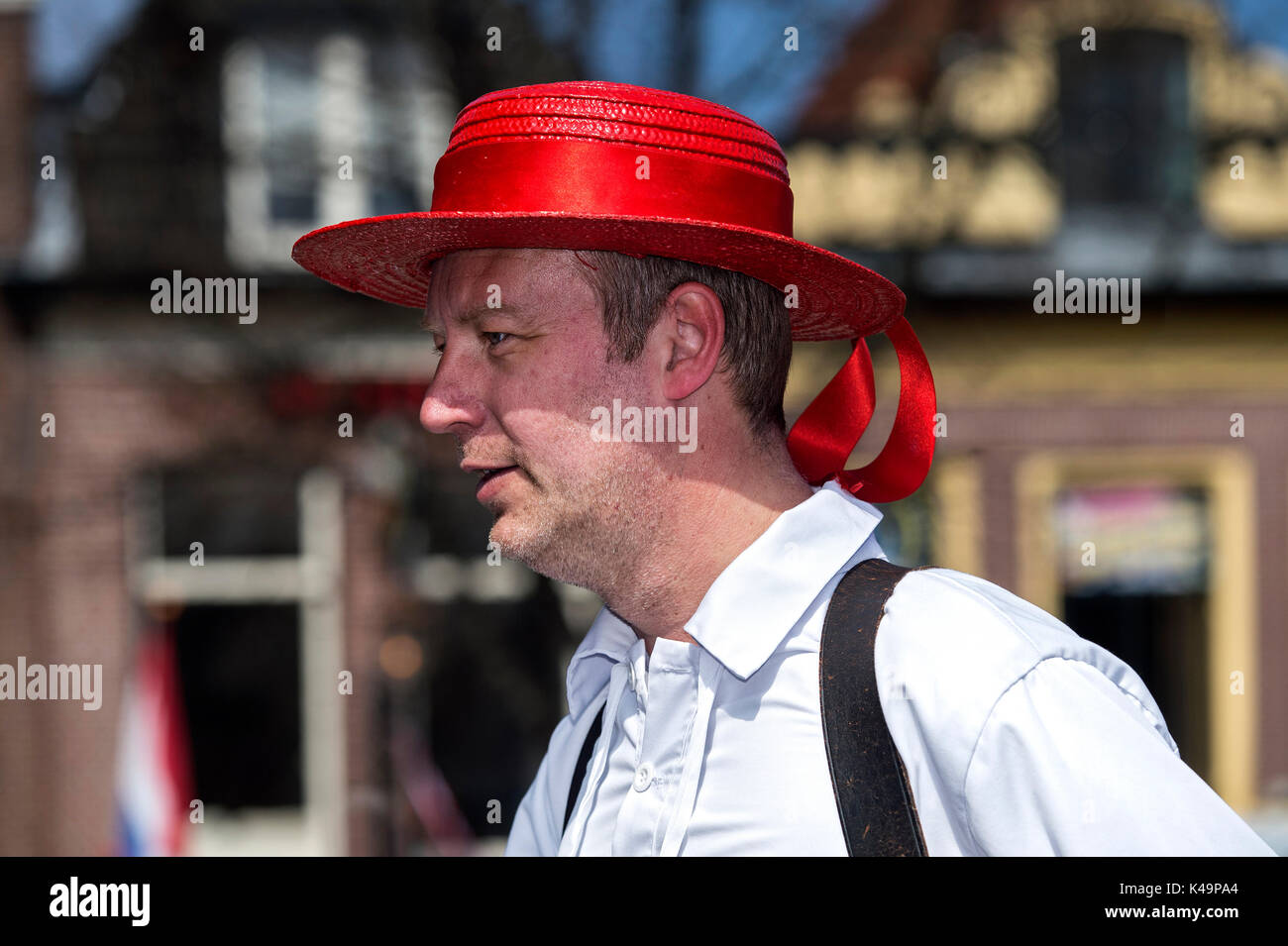 Portrait Of Mr Marco Schuit, Member Of The Cheese Carriers Guild Wearing A Red Hat, Cheese Market Alkmaar, Netherlands Stock Photo