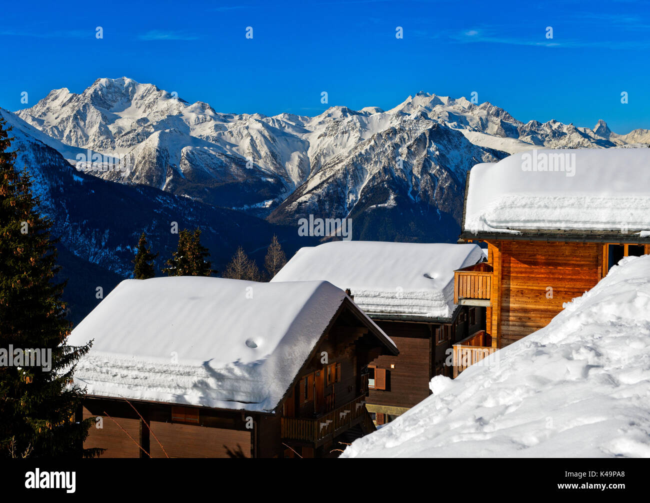 Swiss Chalets With Thick Snow Cover On The Roof In The Swiss Alps, Bettmeralp, Valais, Switzerland Stock Photo