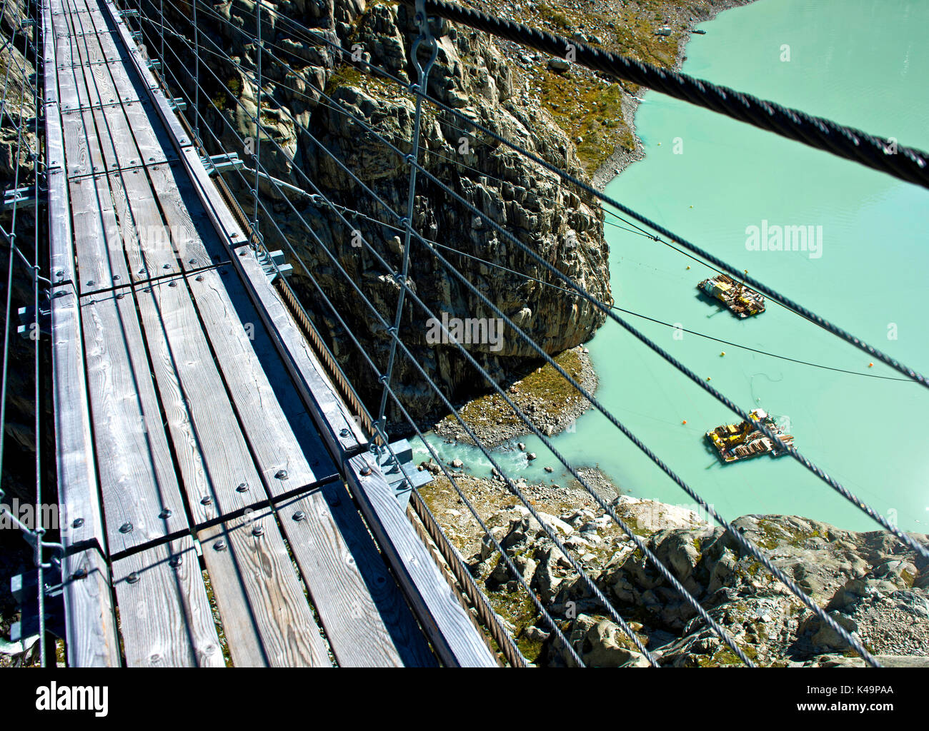 View From The Suspension Bridge Trift Bridge On The Trift Lake, Gadmen, Canton Of Bern, Switzerland Stock Photo