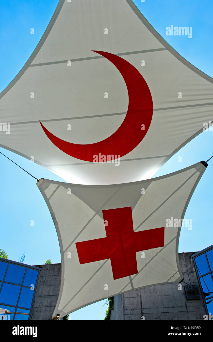 Red Cross Flag And Flag Of The Red Crescent, International Red Cross And Red Crescent Museum, Geneva, Switzerland Stock Photo
