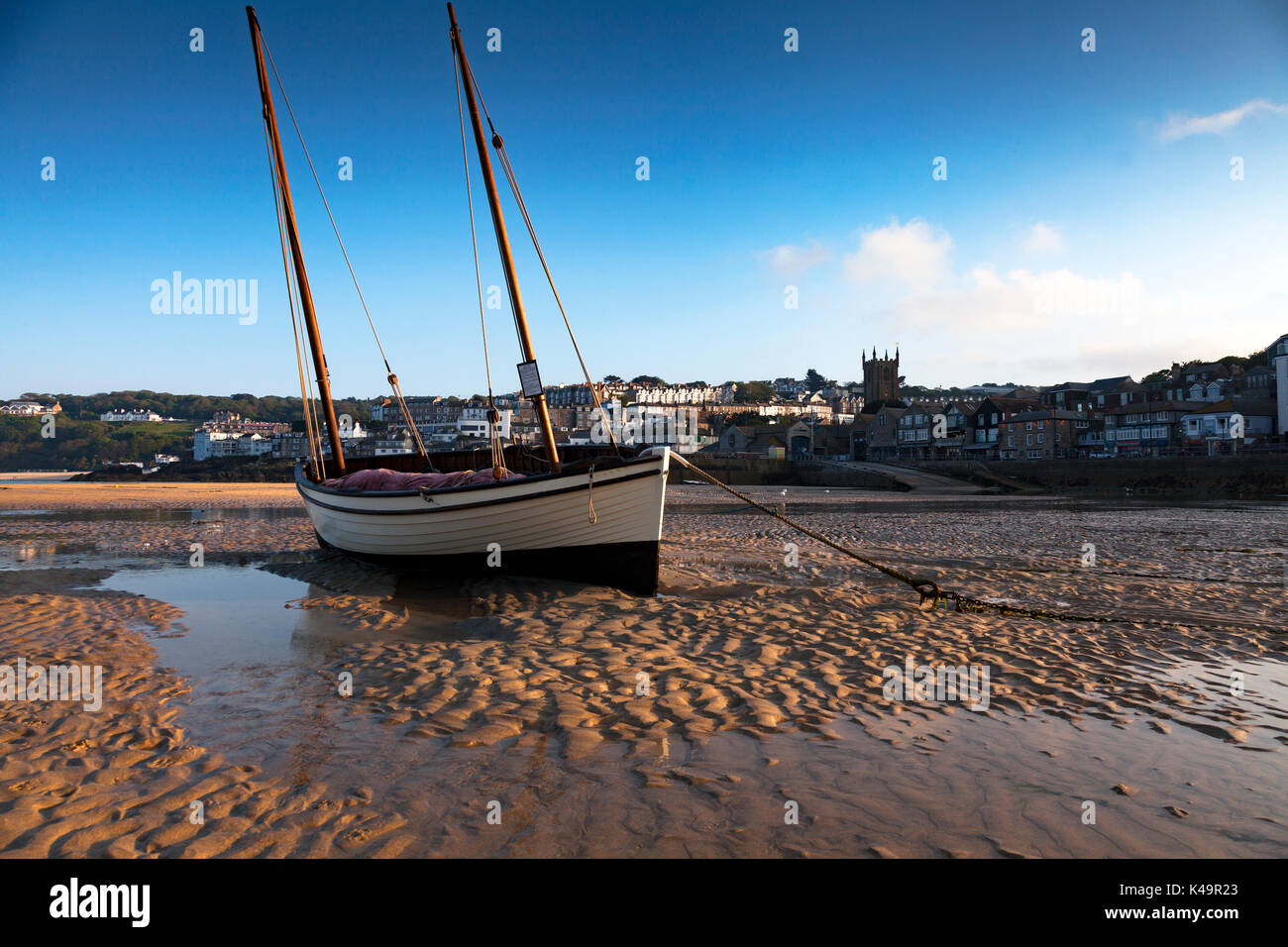 Boat In Harbor, Low Tide, St Ives, Cornwall, England, Uk Stock Photo