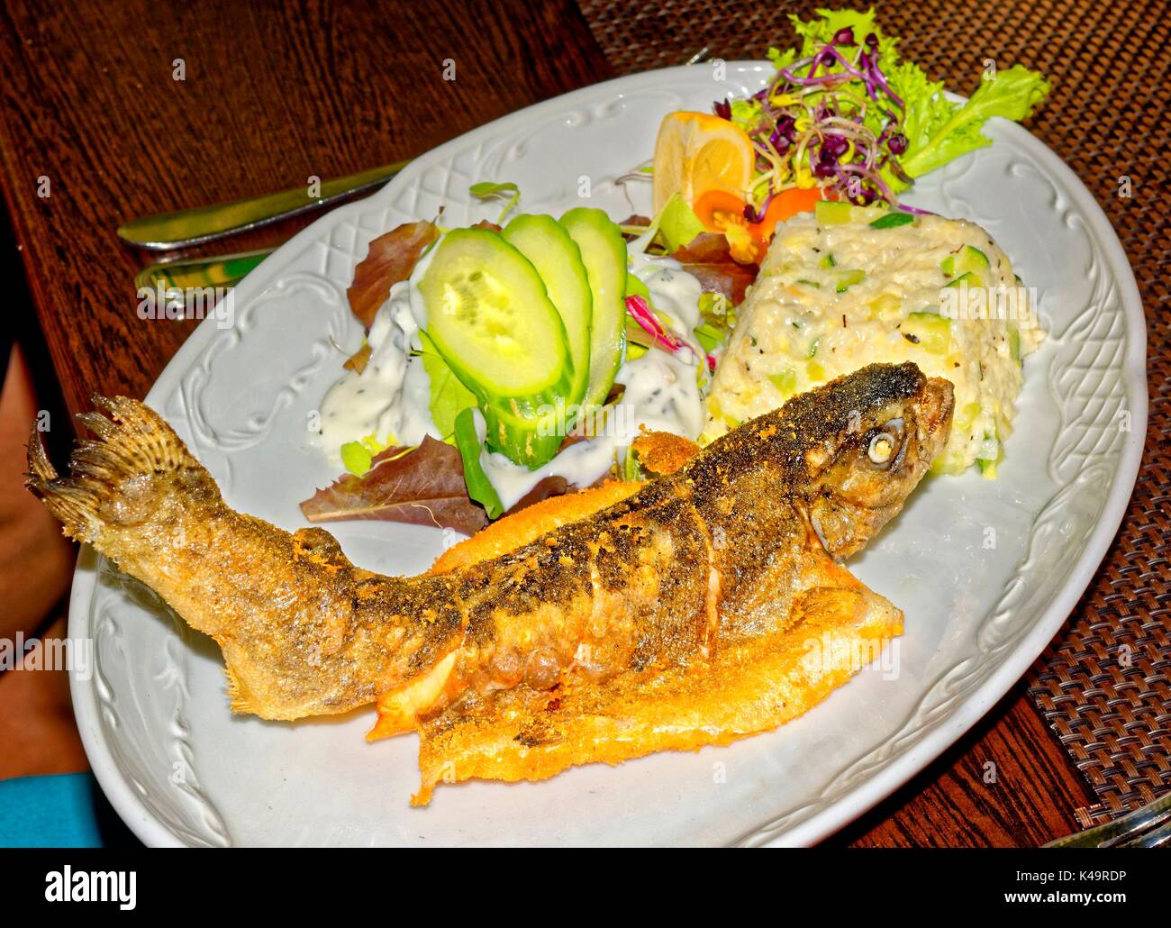 On Rost Grilled Trout With Zucchini Risotto Stock Photo