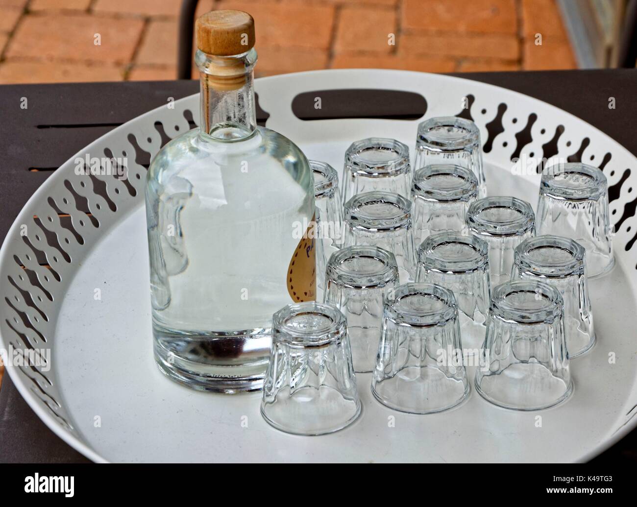 Weisses Round Tray With Liquor Bottle And Glasses Stock Photo