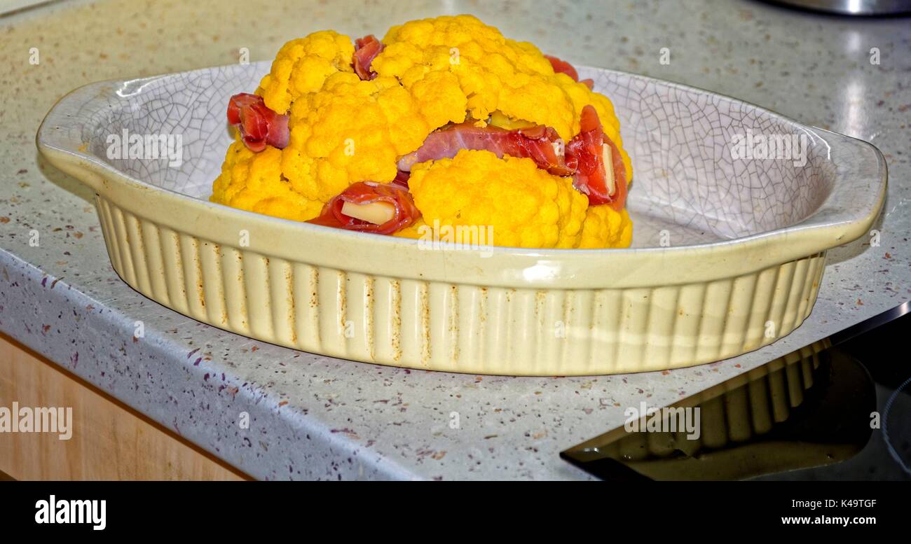 Cauliflower Spiked With Raw Ham And Emmentaler Cheese Stock Photo Alamy