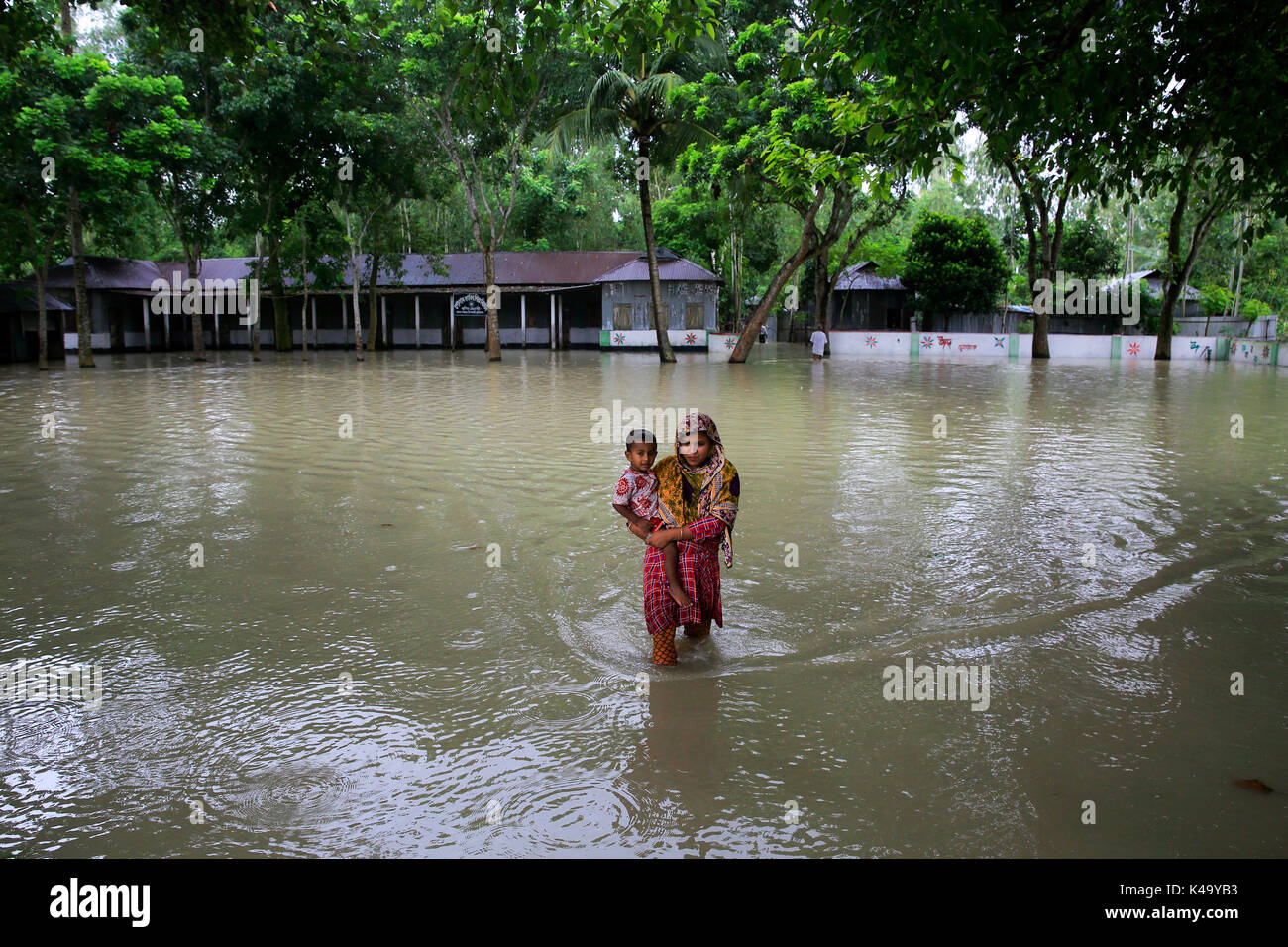 A school Chilmari in Kurigram district is submerged under water as the ...