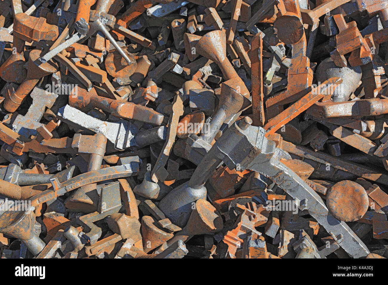 Metal rubbish, cast iron, on a scrap yard, to the recycling in a