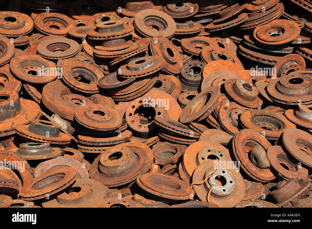 Scrap iron, here brake discs from cars, scrap yard, recycling company, Alteisen, hier Bremsscheiben aus Autos, Schrottplatz, Recyclingbetrieb Stock Photo