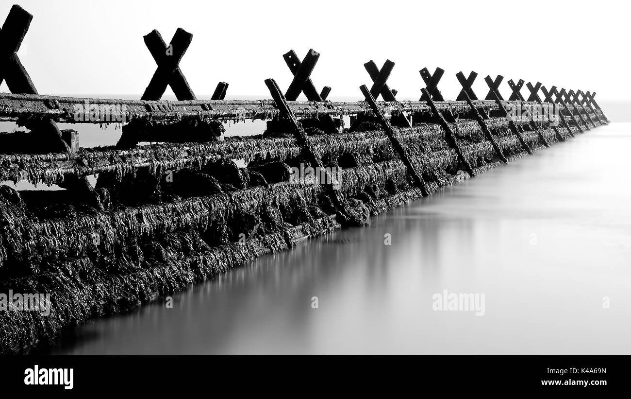 Capturing a serene seascape at Walton on the Naze using long exposures. Stock Photo