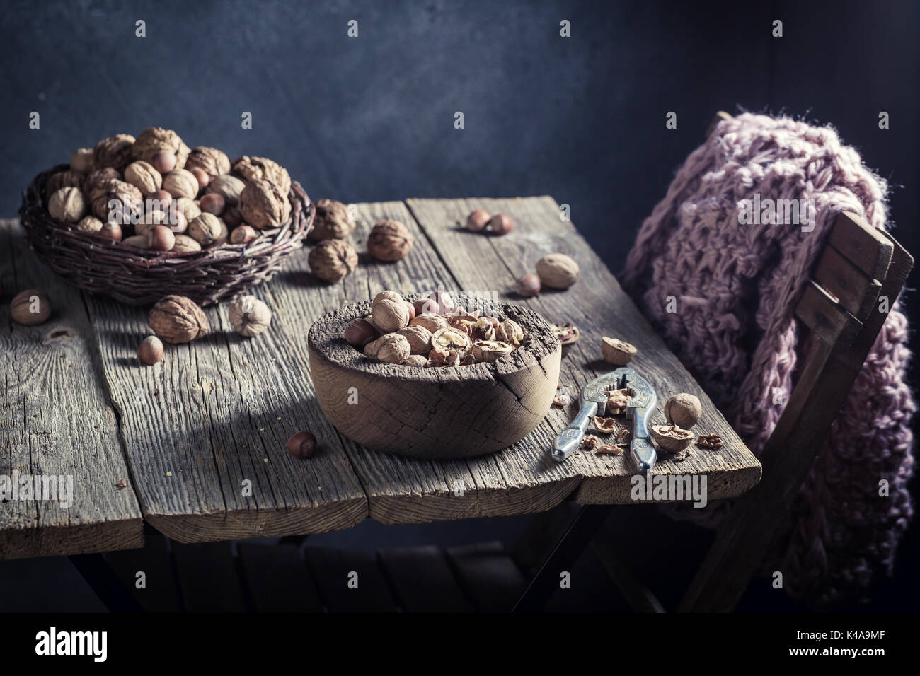 Fresh various nuts with on rustic wooden table Stock Photo