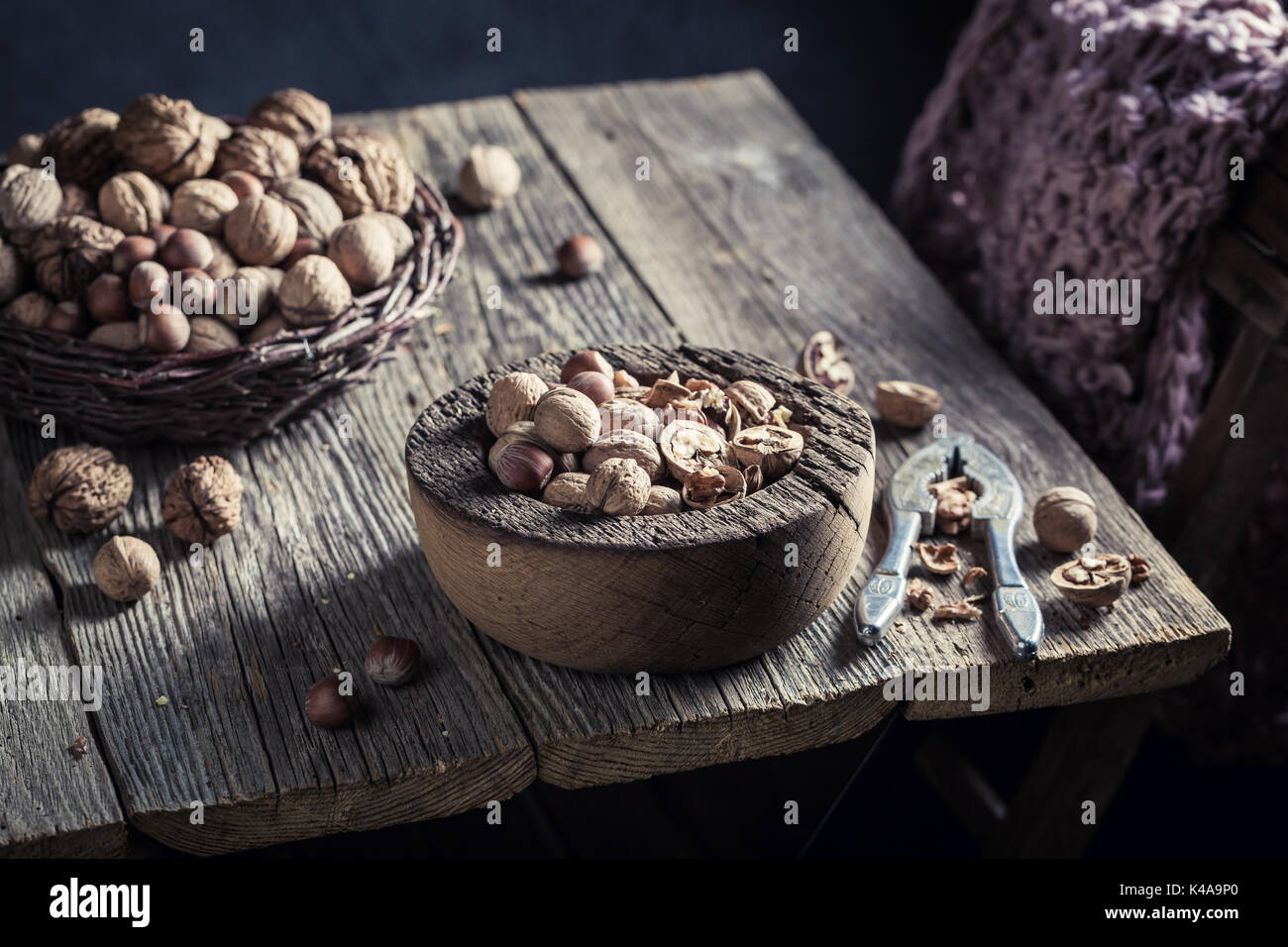 Fresh various nuts with with old nutcracker Stock Photo
