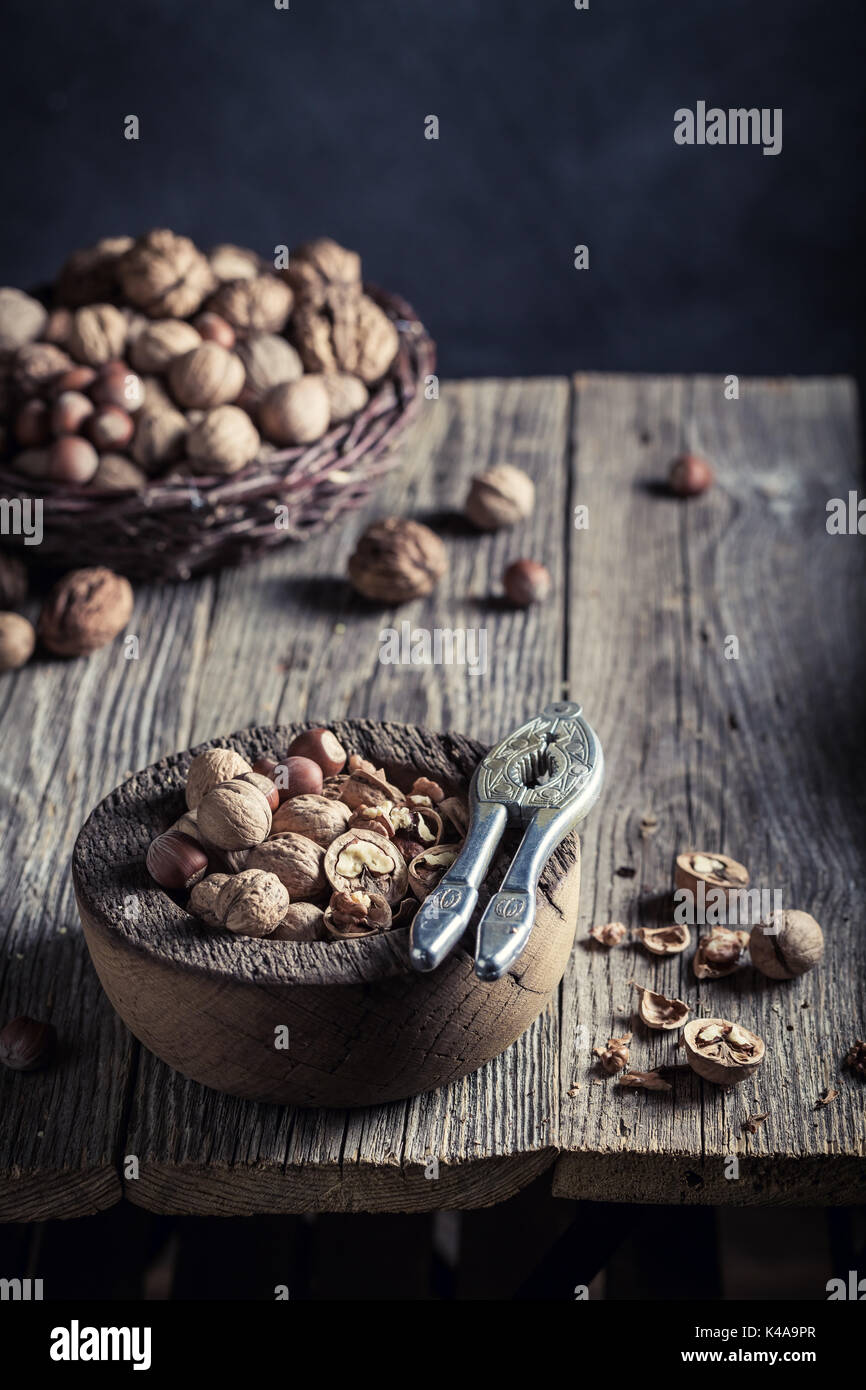 Healthy various nuts with on rustic wooden table Stock Photo