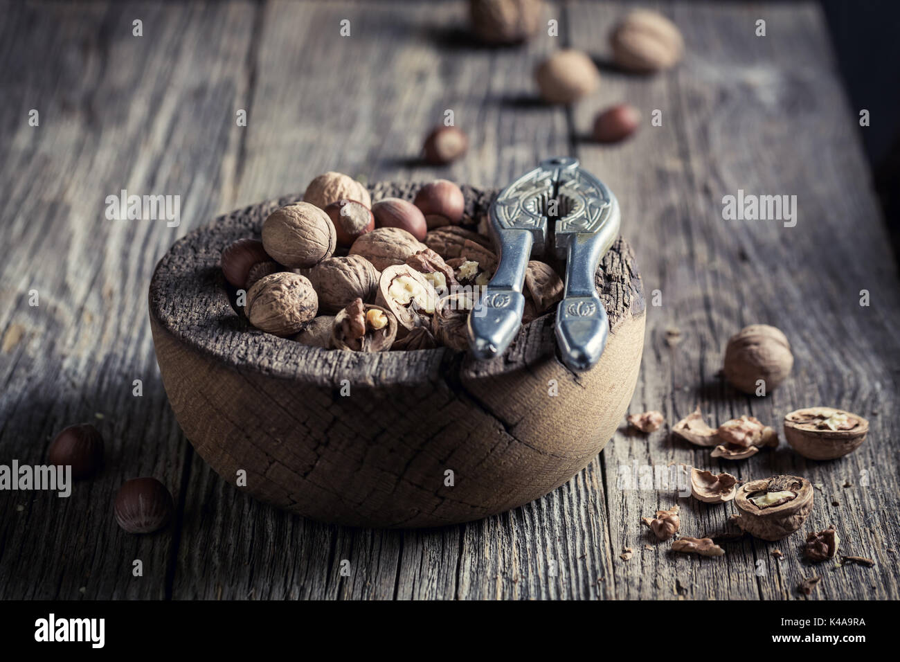 Delicious various nuts with on rustic wooden table Stock Photo