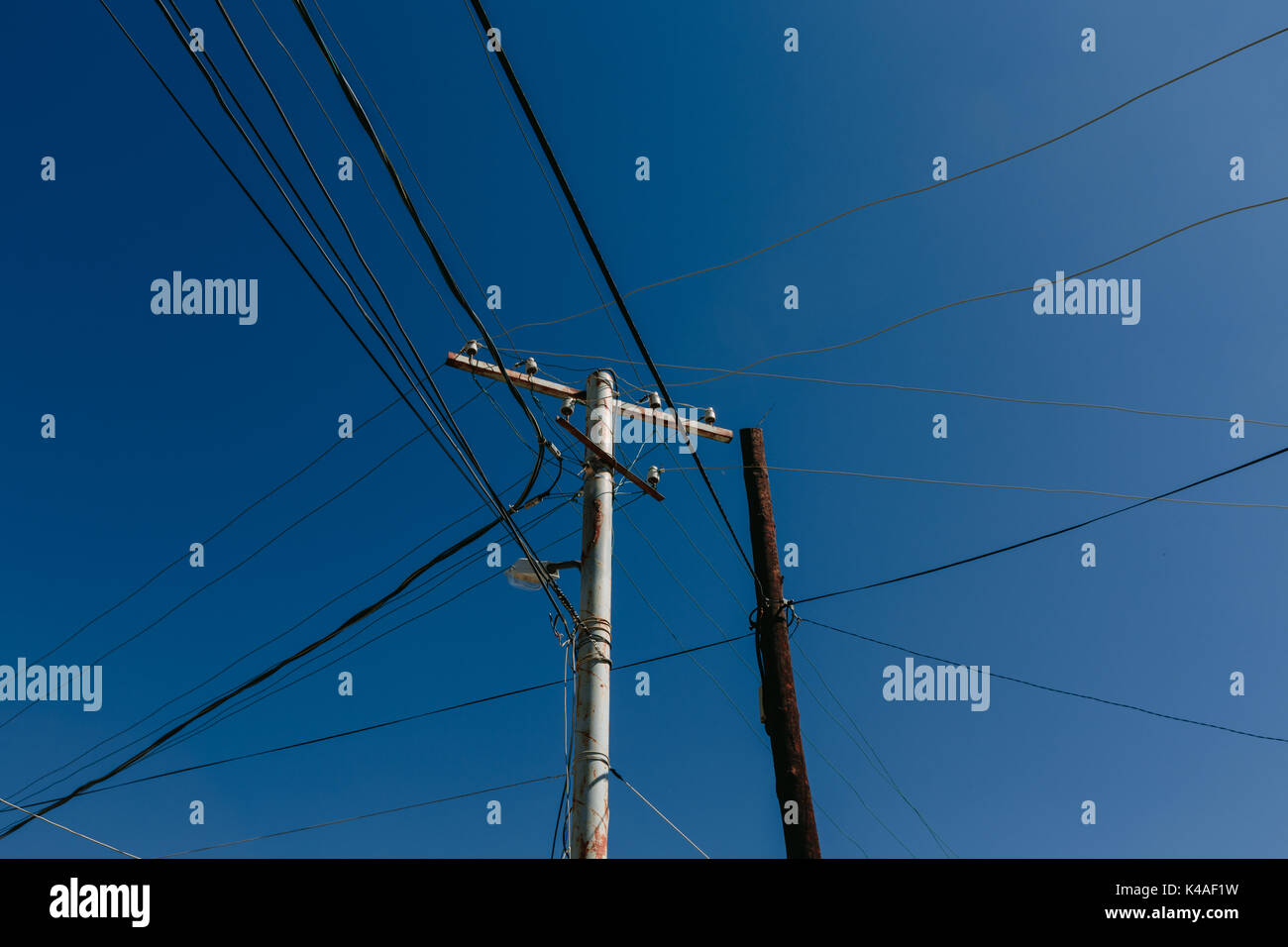 Electric wires on the pole Stock Photo - Alamy