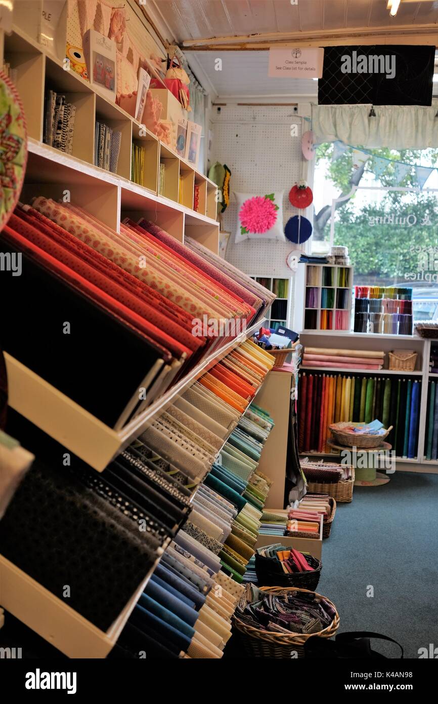 cloth bolts in quilt shop Stock Photo Alamy