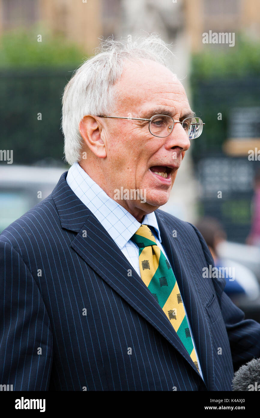 London, UK. Conservative politician Peter Bone gives a TV interview in Parliament Square. Stock Photo