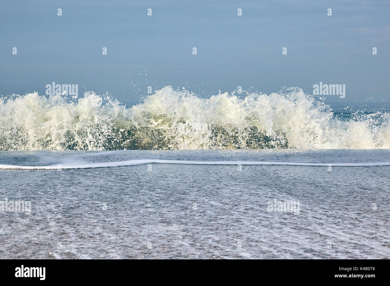 Waves Wash Round The North Sea Beach Stock Photo