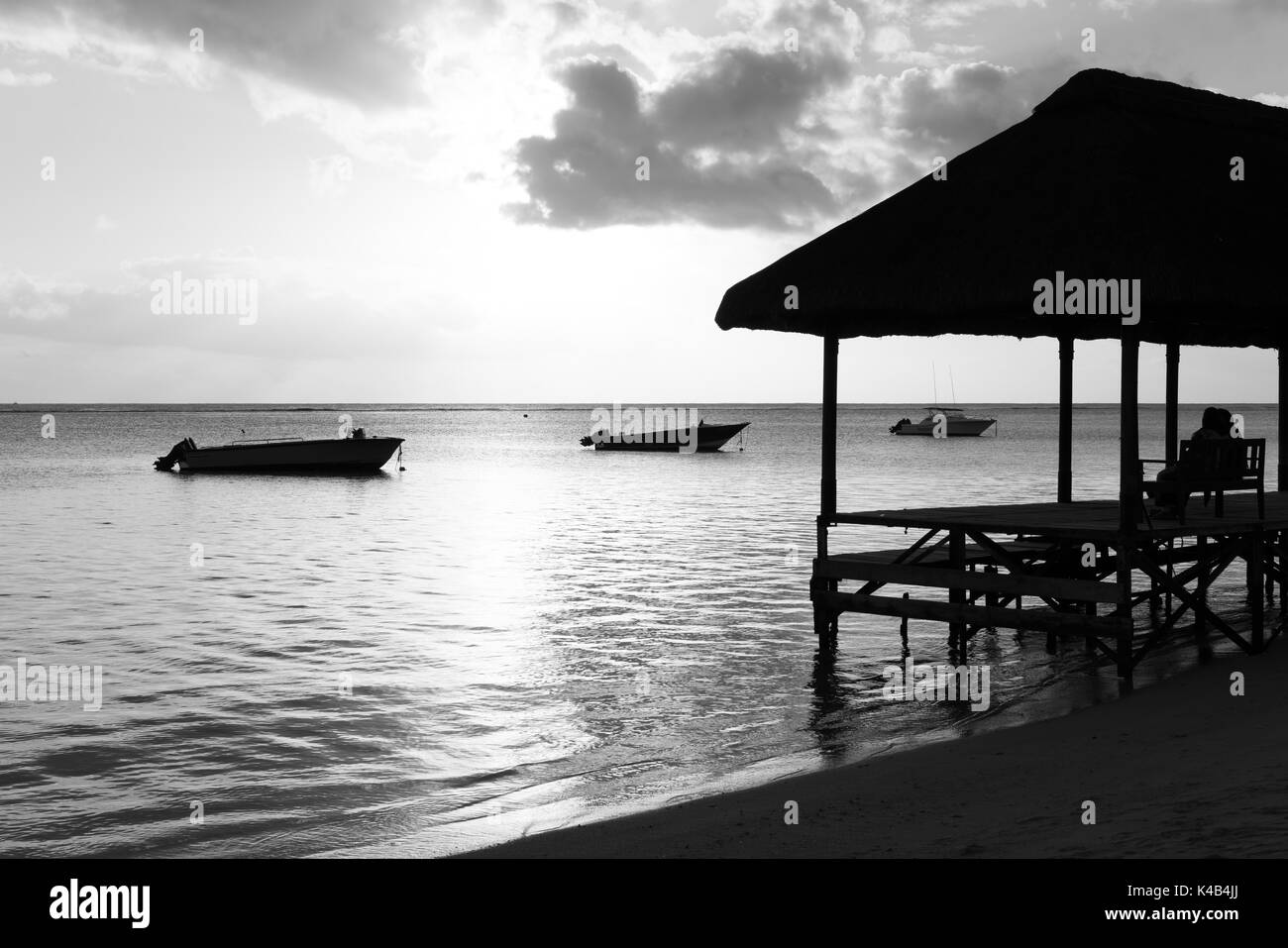 Resting on remote Paradise beach,Mauritius island.black and white. Stock Photo