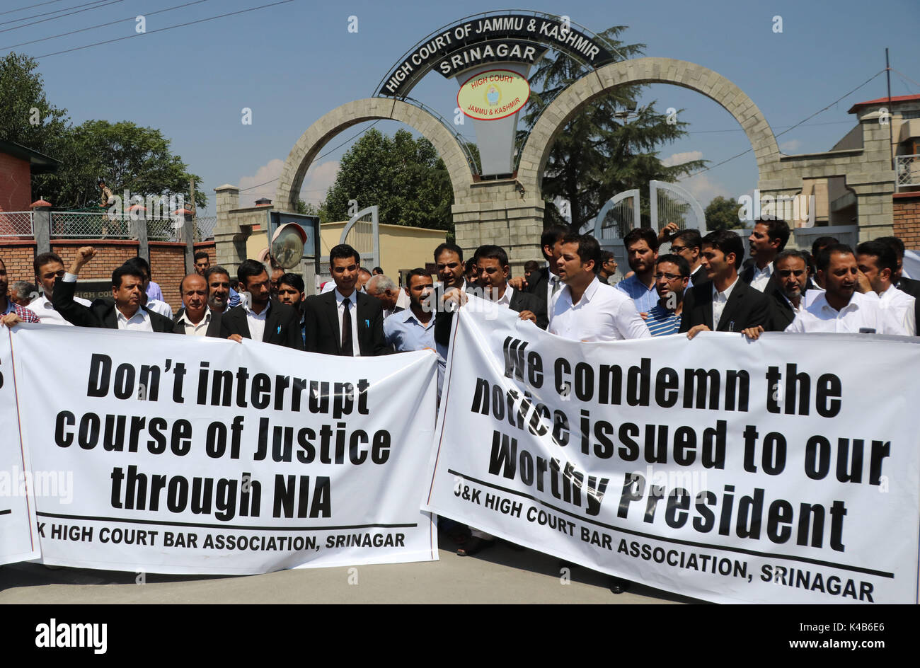 Jammu and Kashmir Bar Association members holding banners reading ‘Don