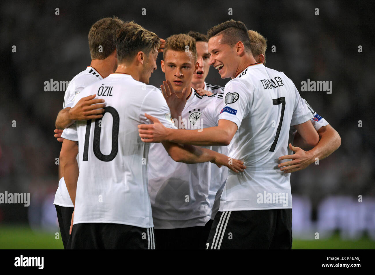 UK AND IRELAND RIGHTS ONLY  Mesut Ozil of Germany celebrates with Joshua Kimmich of Germany and Julian Draxler of Germany during the FIFA World Cup 2018 Qualifying Group C match between Germany and Norway at Mercedes-Benz-Arena on September 4th 2017 in Stuttgart, Germany. (Photo by M.I.S/Pixathlon/phcimages.com) Stock Photo