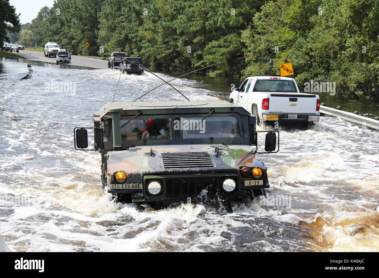 U.S Army soldiers use a humvee jeep to search for residents in need of assistance trapped by floodwaters in the aftermath of Hurricane Harvey September 4, 2017 in Port Arthur, Texas. Stock Photo
