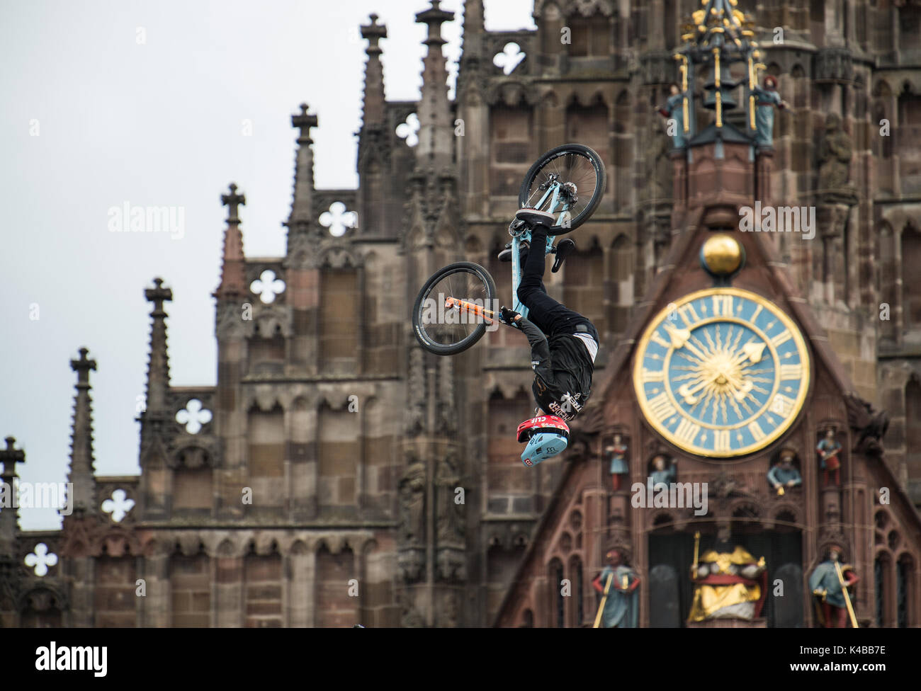 Nuremberg, Germany. 2nd Sep, 2017. Canadian mountainbiker Brett Rheeder performs a backflip at the 'Red Bull District Ride' on the Hauptmarkt square in Nuremberg, Germany, 2 September 2017. During the competition, the riders present their skills with jumps and tricks in a parcours leading through the old town. The District Ride has taken place in 2005, 2006, 2011 and 2014 in Nuremberg. Photo: Silas Stein/dpa/Alamy Live News Stock Photo