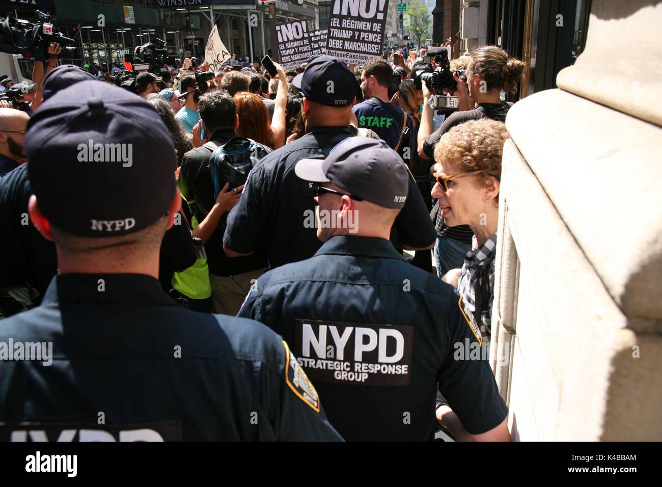New York, Us. 05th Sep, 2017. Hundreds of immigrants who came to the USA illegally as children gathered outside Trump Tower on 5th September, 2017, to protest US President Donald Trump's decision to rescind the Deferred Action for Childhood Arrivals (DACA), a program designed to protect immigrants created by President Barack Obama in 2012. There were several arrests when demonstrators linked hands and formed a human chain that blocked traffic along 56th Street and Fifth Avenue in front of Trump Towers. Credit: G. Ronald Lopez /DigiPixsAgain.us/Alamy Live News Stock Photo