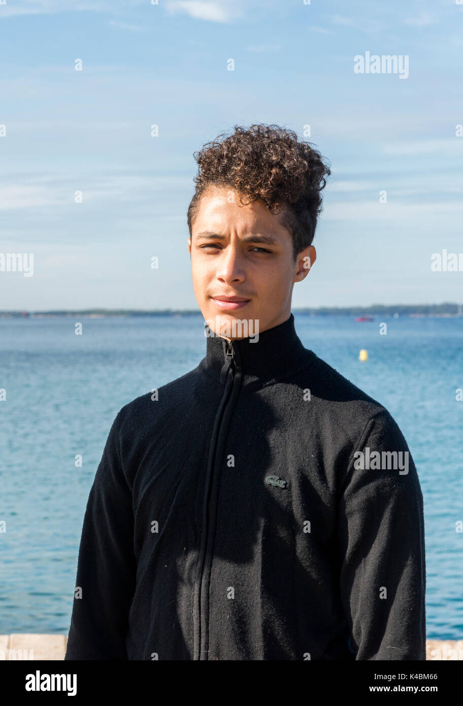 Young French men of Algerian descent pose for a picture in Juan les Pins, Cote d'Azur, France. France has large MAGHRE population Stock Photo