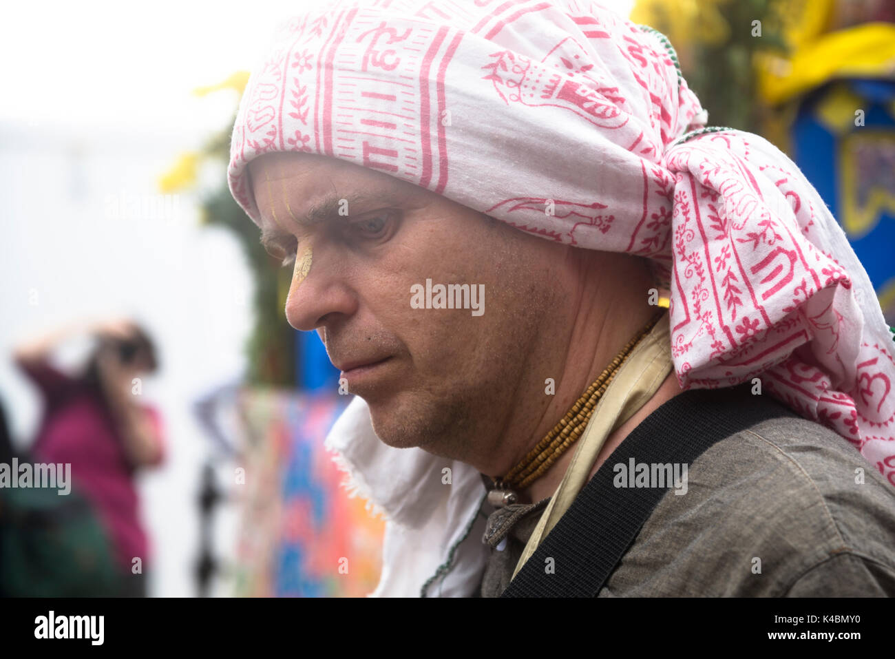 Hare Krishna devotee in the streets of Curitiba downtown Stock Photo - Alamy