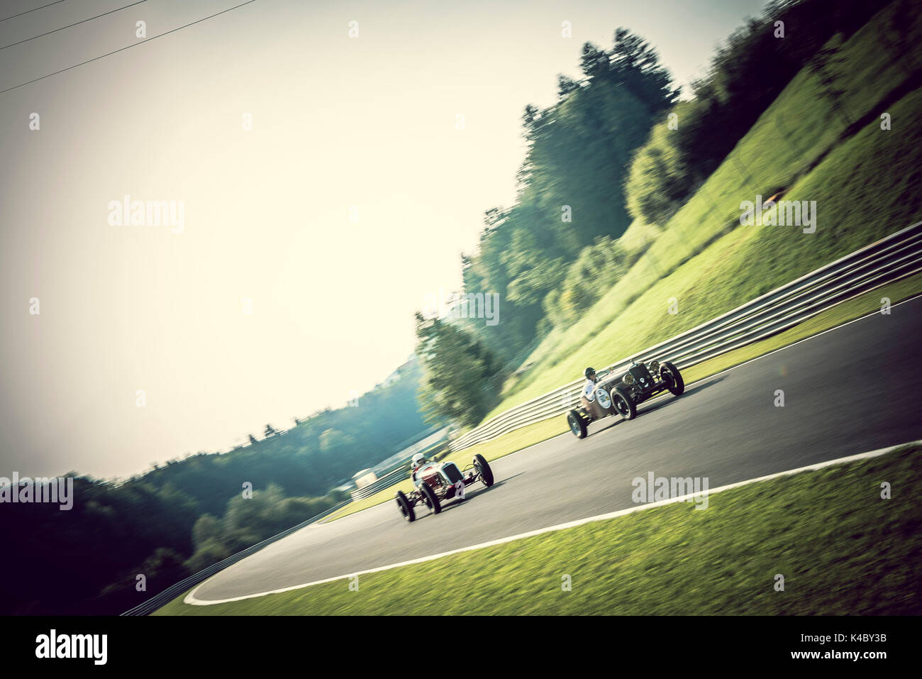 Classic Riley vs Maserati - Classic Car Racing Stock Photo - Alamy