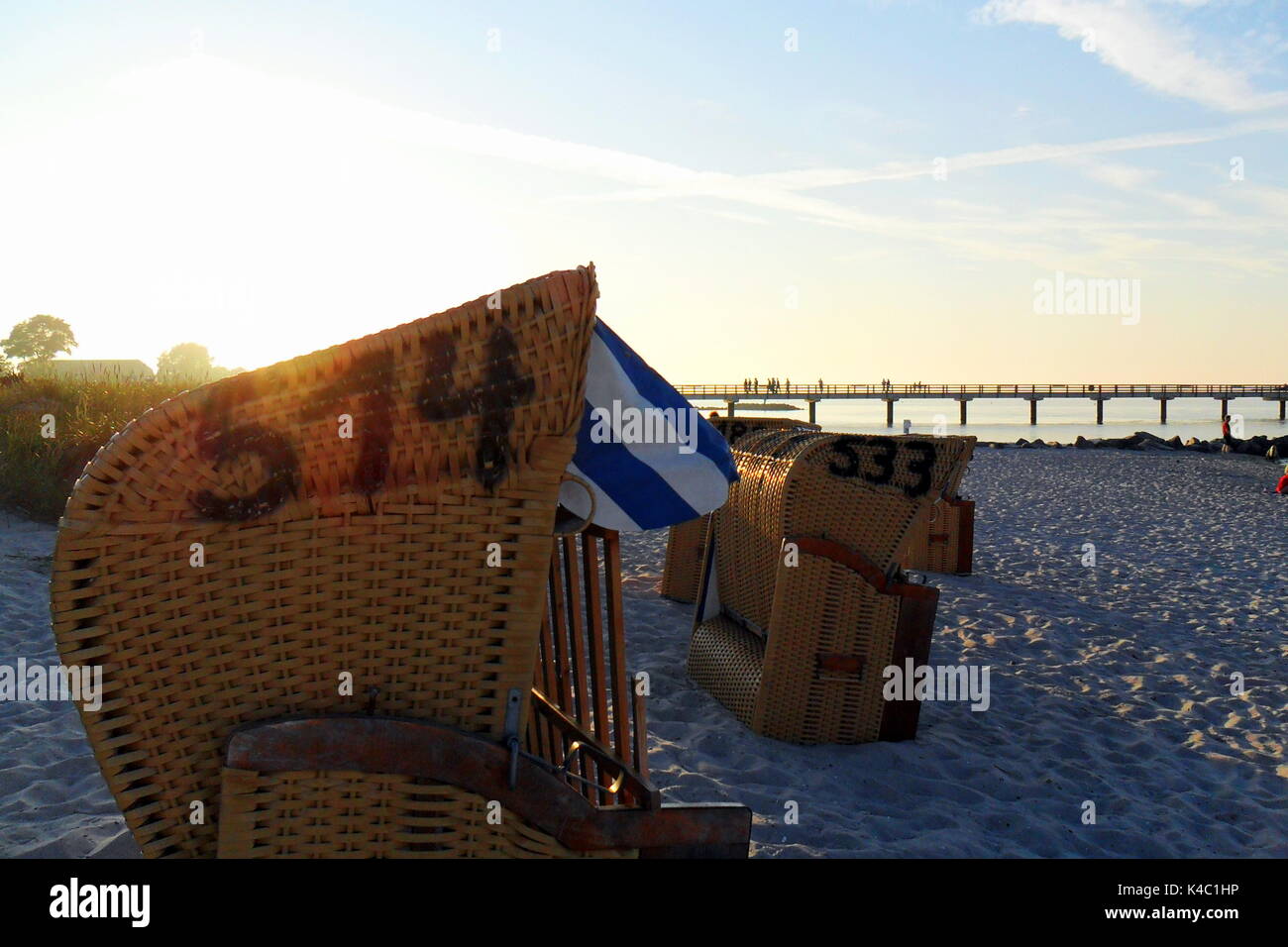 Strandkorb/beach chair on Usedom, Baltic Sea during sunset Stock Photo