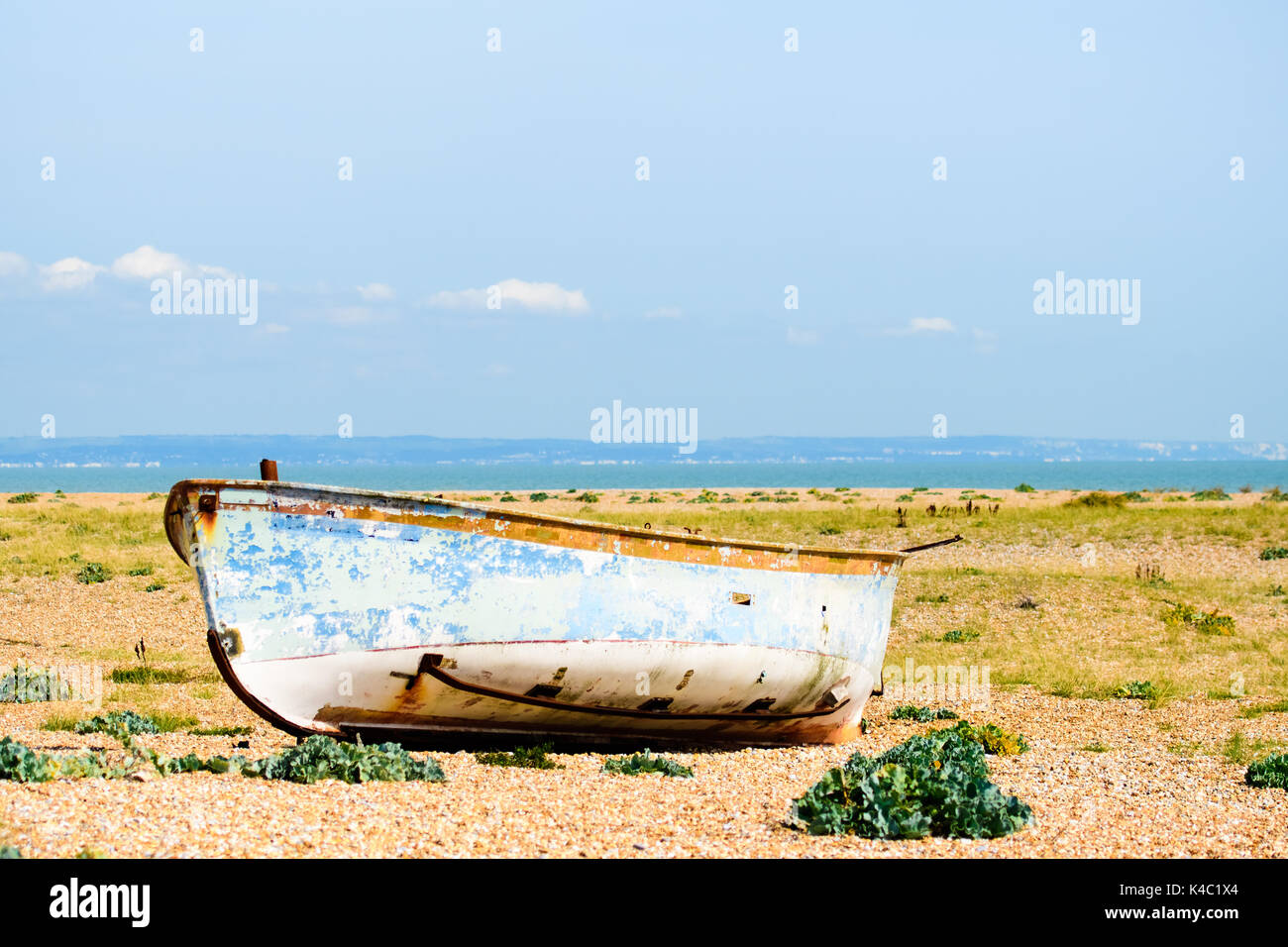 Old fishing boats left on beach at Dungeness Kent Stock Photo - Alamy