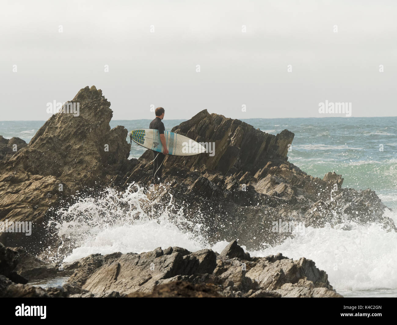 Rocks and surf girl hires stock photography and images Alamy