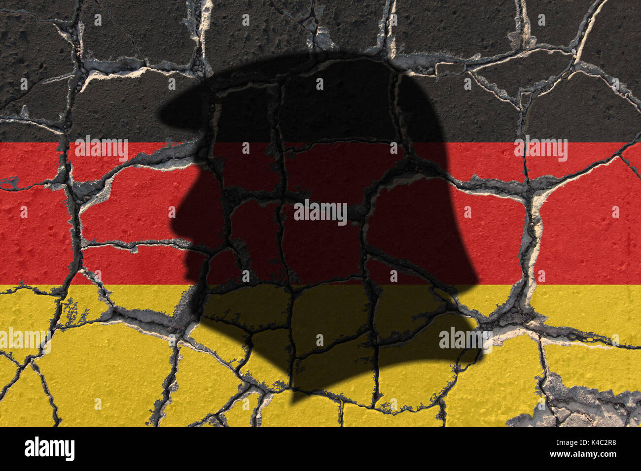 Silhouette Of Donald Trump With Flag Of Germany On Eroding Ground Stock Photo