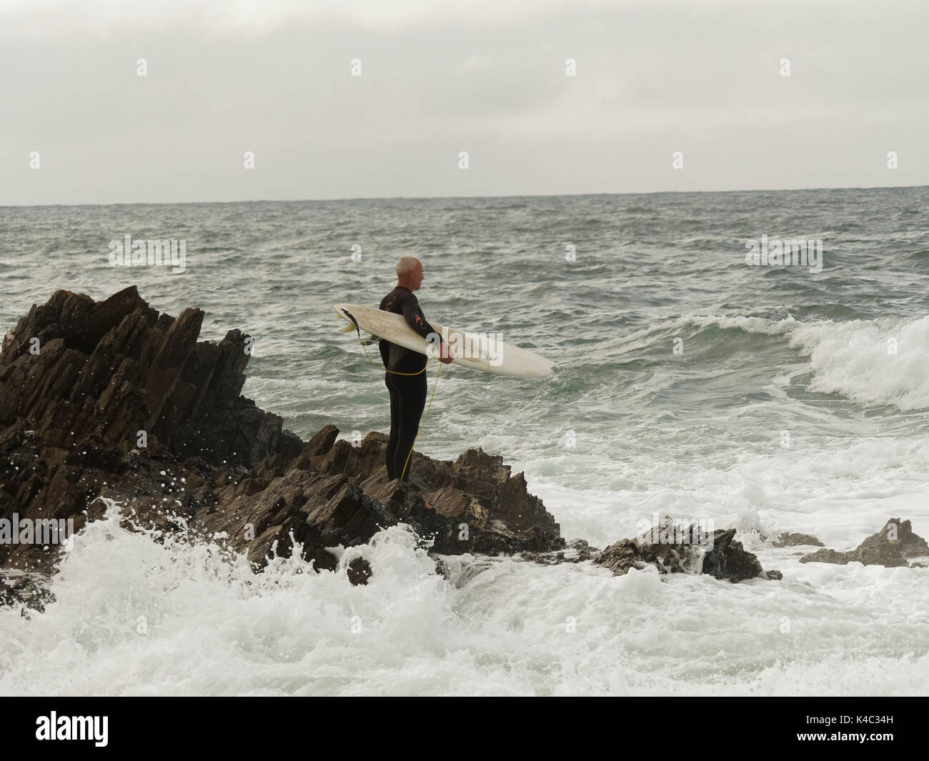 Girl surfing waves hires stock photography and images Alamy