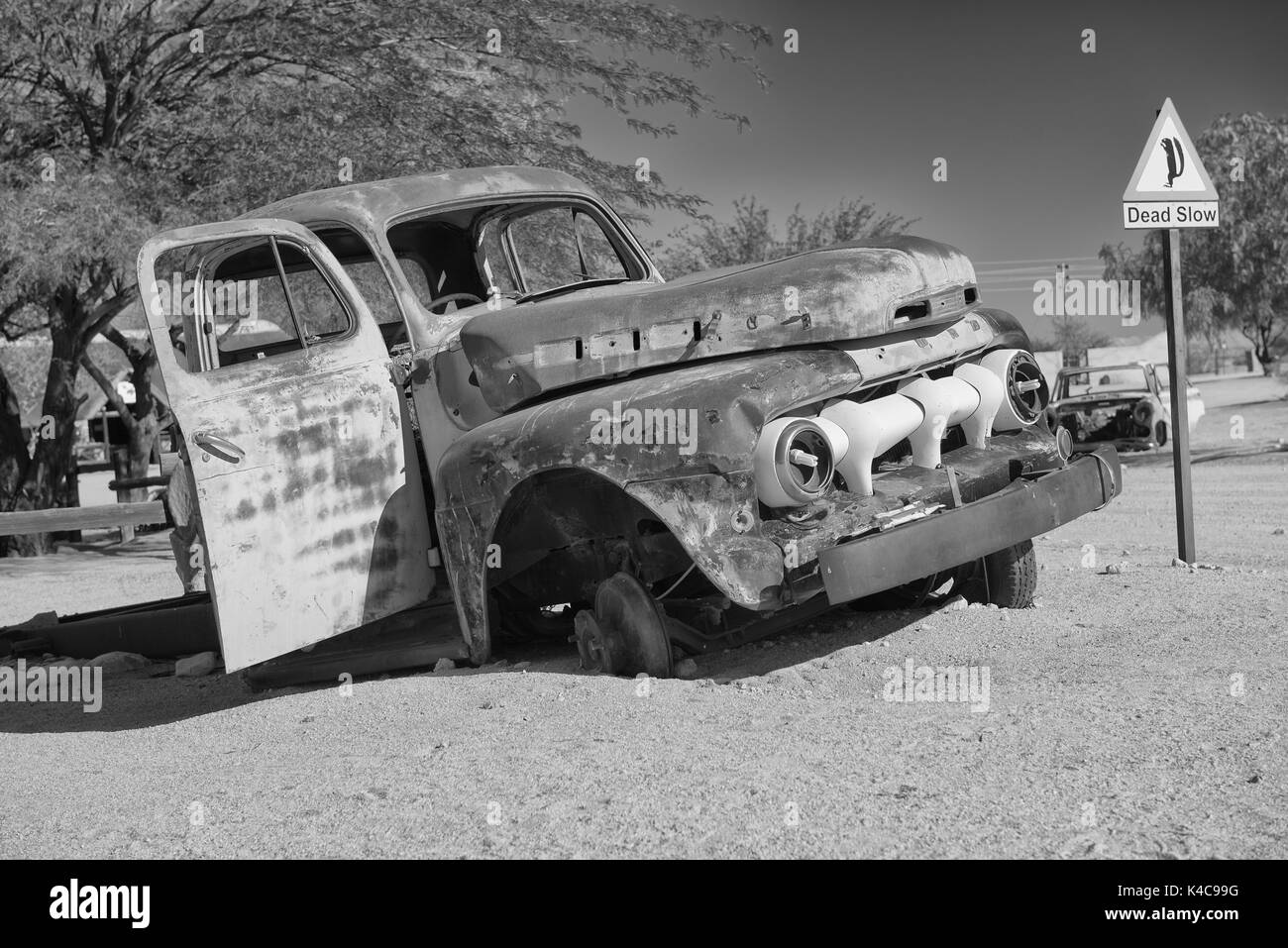 Car Wreck At The Edge Of The Desert, Solitaire, Namibia Stock Photo