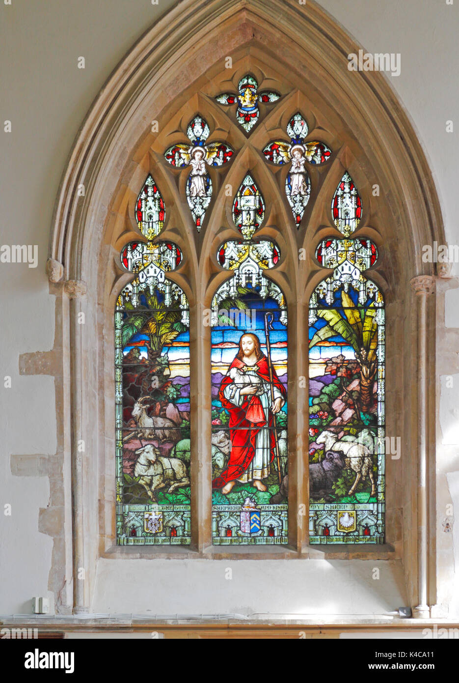 A stained glass window in the parish church of St James at Southrepps, Norfolk, England, United Kingdom. Stock Photo