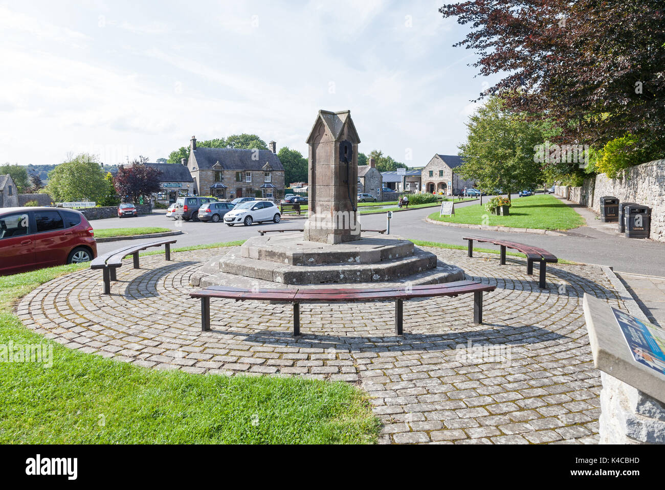 The old village water pump at Hartington village in the Derbyshire Peak District, England, UK Stock Photo
