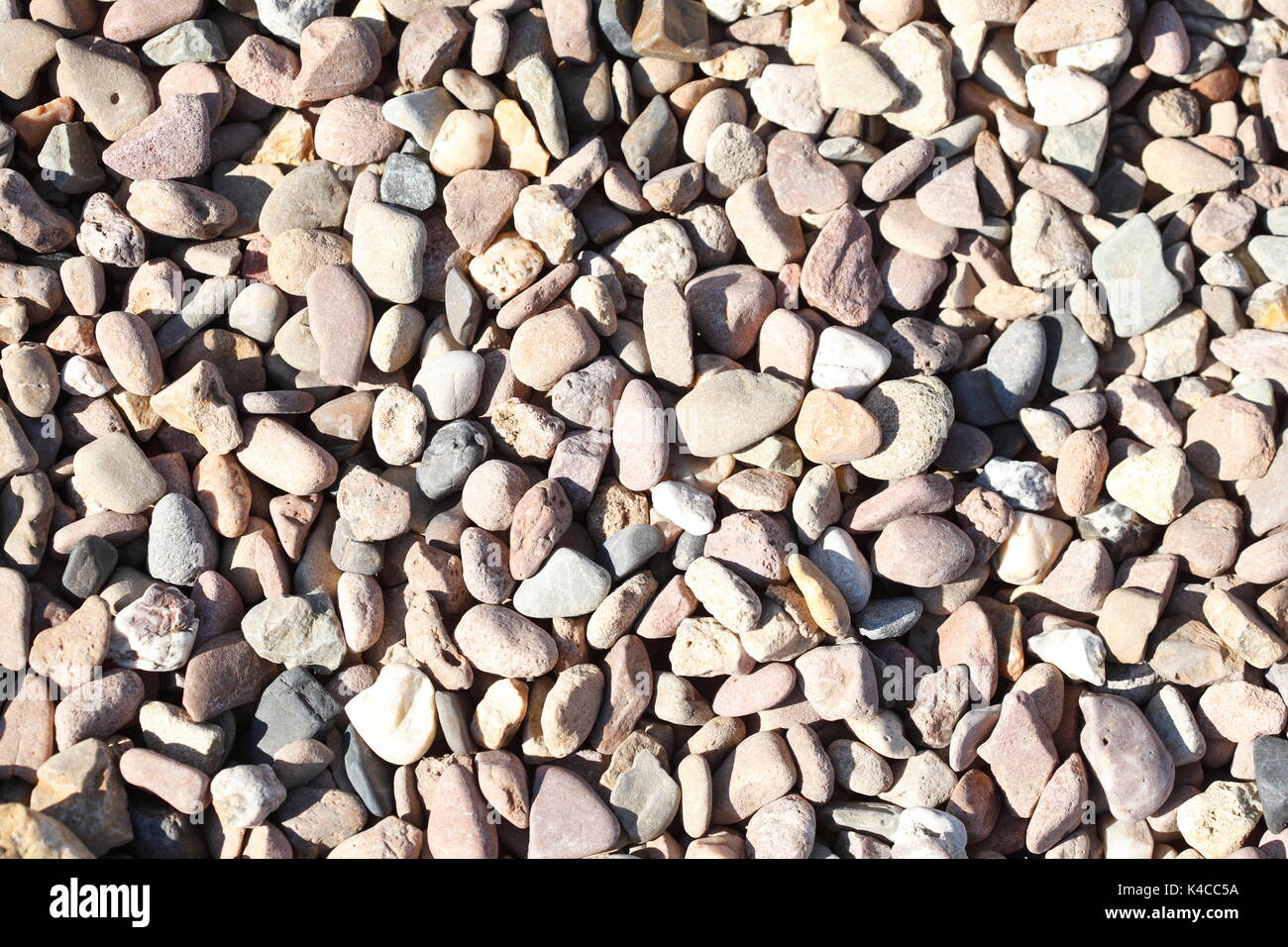 brown little grit stones as floor covering Stock Photo Alamy