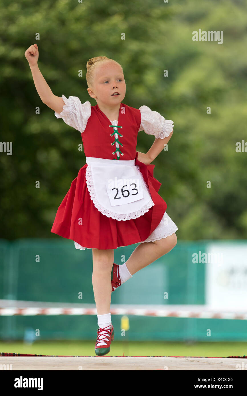 Aberlour, Scotland, UK. 05 Aug, 2017: Young dancer performing the Irish Jig during the 2017 Highland Games in Aberlour, Scotland. Stock Photo