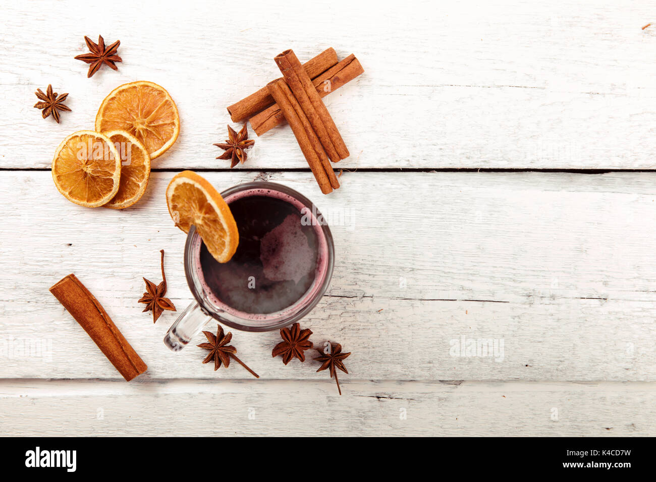 mulled wine with spices on white wooden table. top view copy space Stock Photo