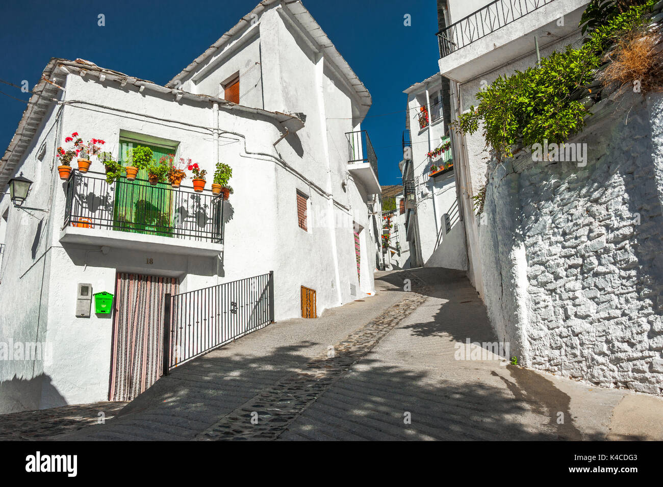 Flowery Lane At Village Trev lez, Sierra Nevada, Andalusia, Spain Stock Photo