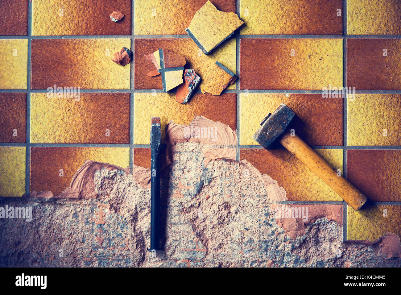 Dismantling Of Old Tiles ,Tools Stock Photo