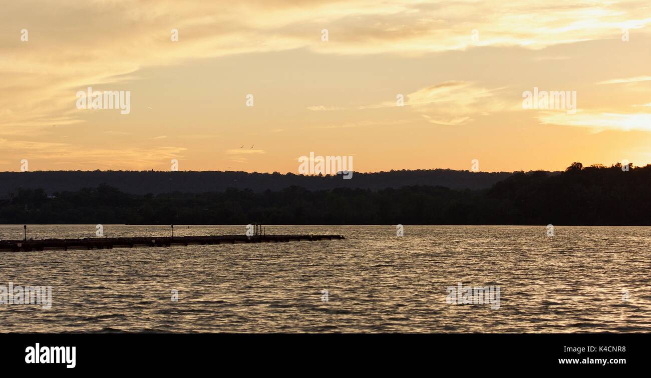 Isolated photo of an amazing sunset on a lake Stock Photo - Alamy